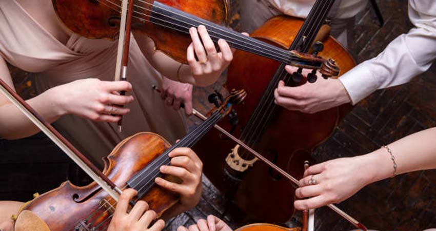 Four people with their instruments